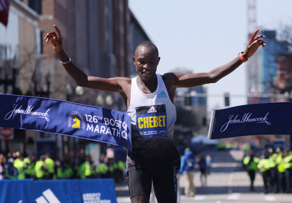 Evans Chebet of Kenya celebrating after winning the men’s race of the Boston Marathon on Monday.